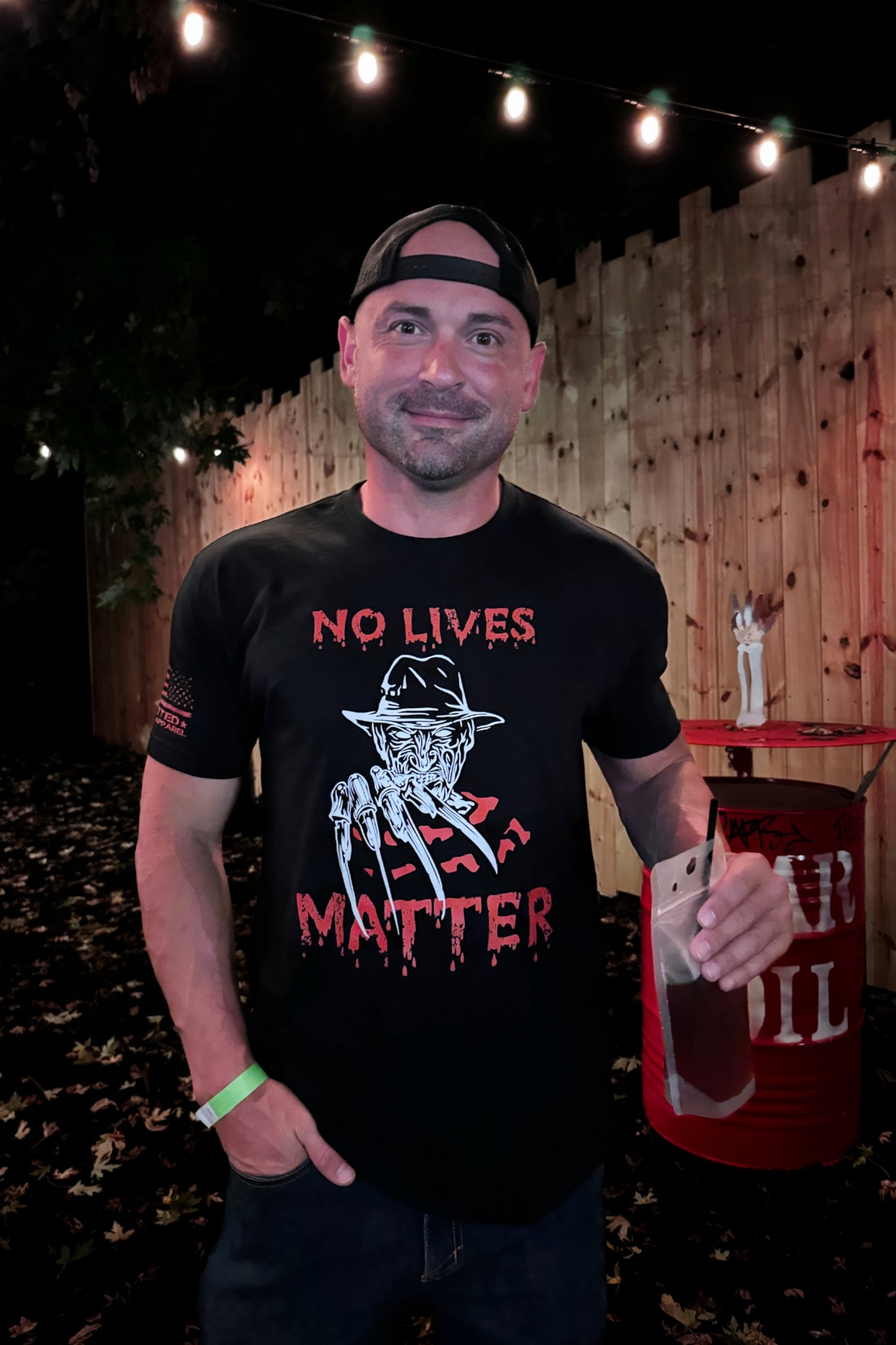Unisex horror shirt with slasher design and bold red text