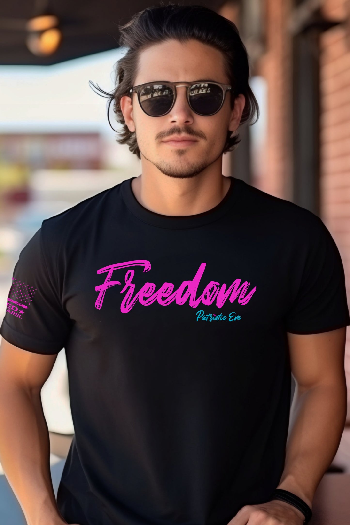 Model wearing FREEDOM in Pink shirt – patriotic apparel for proud Americans