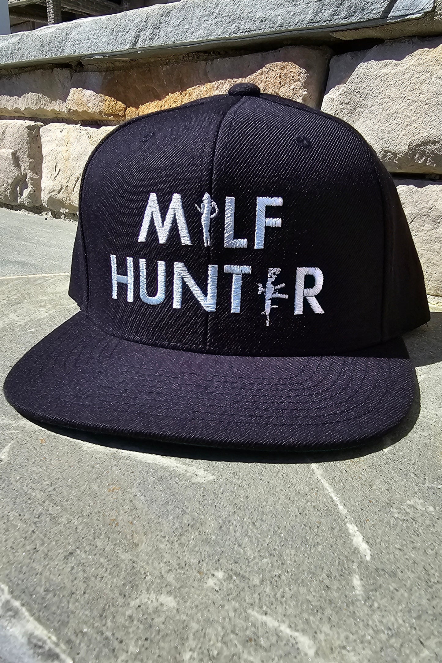 Flat bill hat with bold MILF HUNTER white lettering